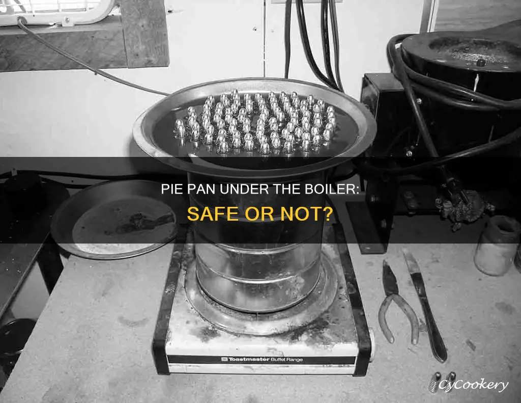 can a place pie pan be put under the boirler