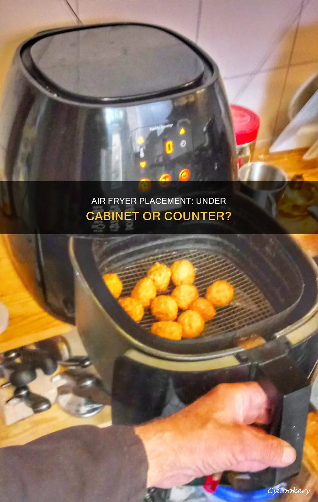 can an air fryer be placed under a cabinet