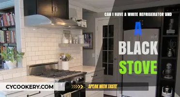 Mixing White Refrigerators and Black Stoves: A Bold Kitchen Design Choice