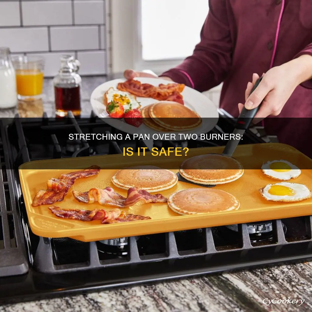 can I stretch pan over 2 flat burners
