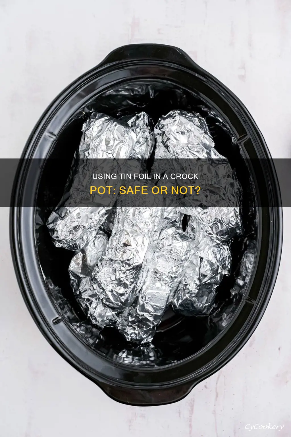 can you cook tin foil pan inside of crock pot