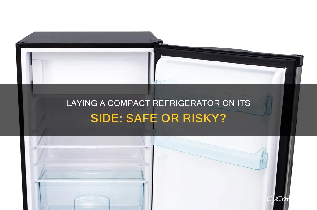 can you lay a compact refrigerator on its side