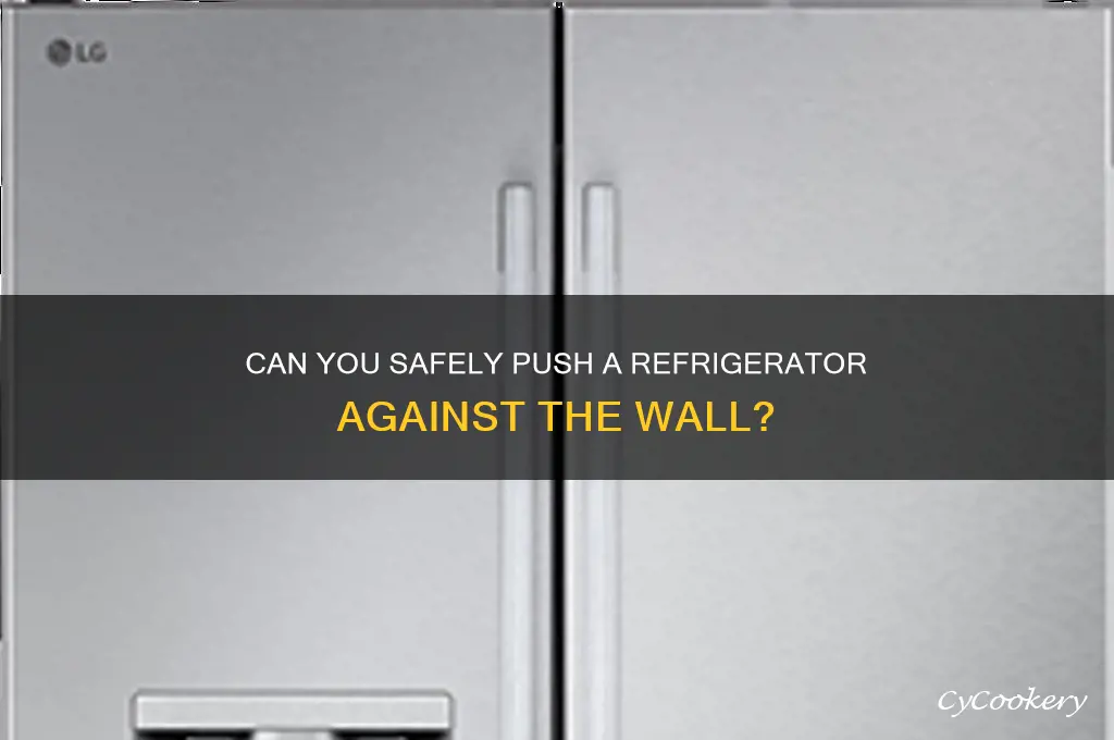 can you push refrigerator up against a wall