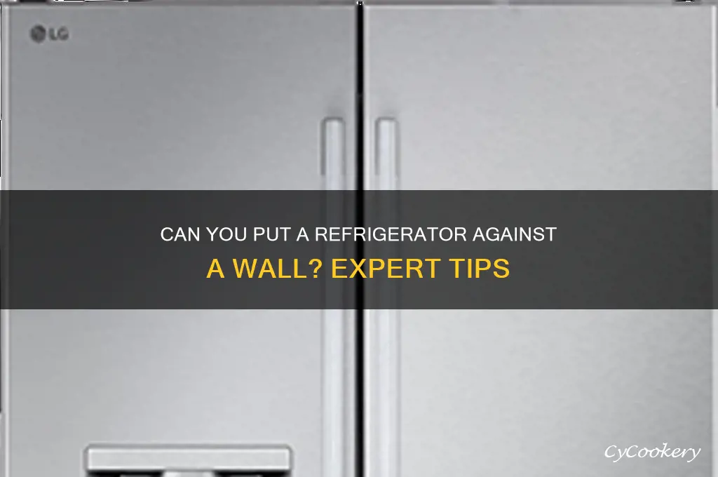 can you put a refrigerator against a wall