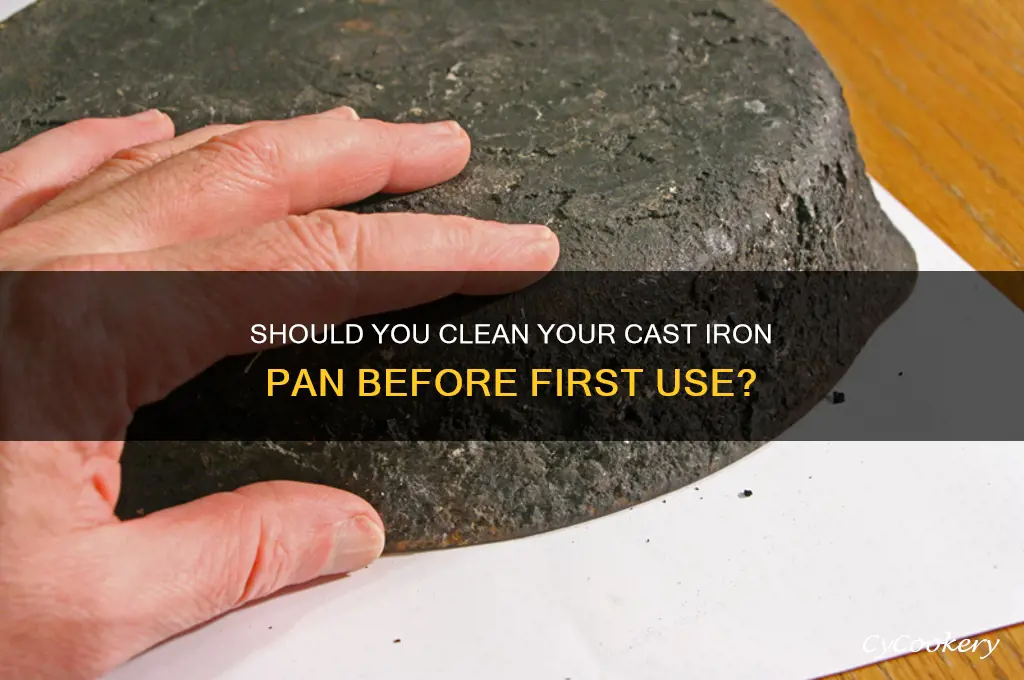 do I clean cast iron pan before use