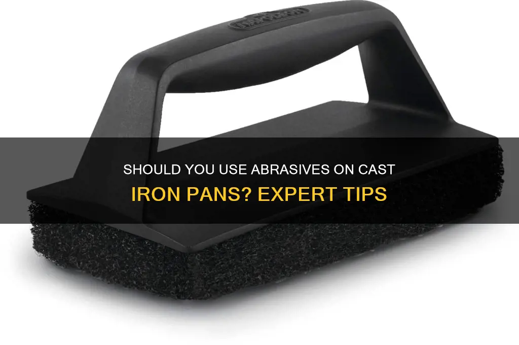 do you use an abrasive on a cast iron pan