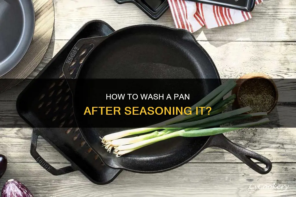 do you wash a pan after seasoning it