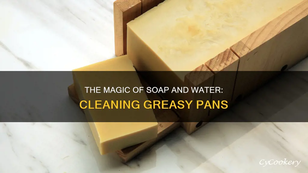 how does soapy water clean greasy pans