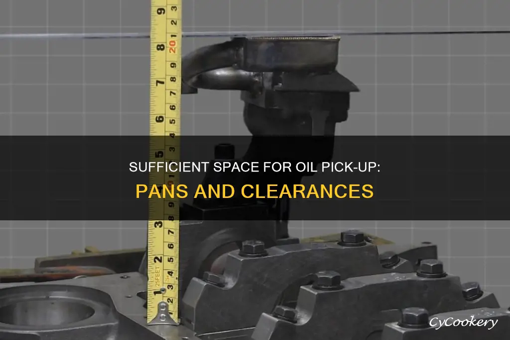 how much space between pan and oil pick up