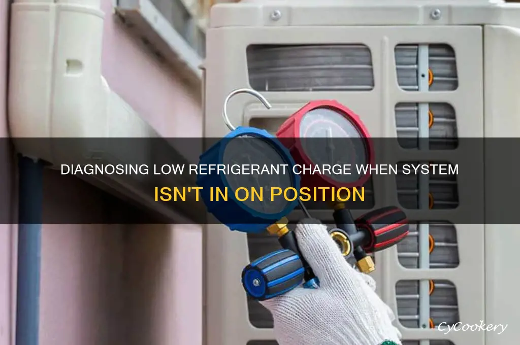 how read low refrigerant charge not in on position