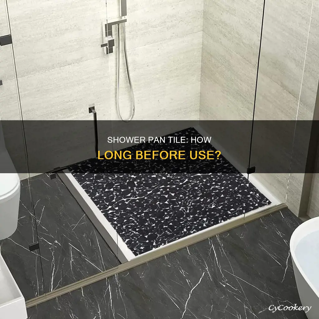 how soon after laying shower pan tile can shower