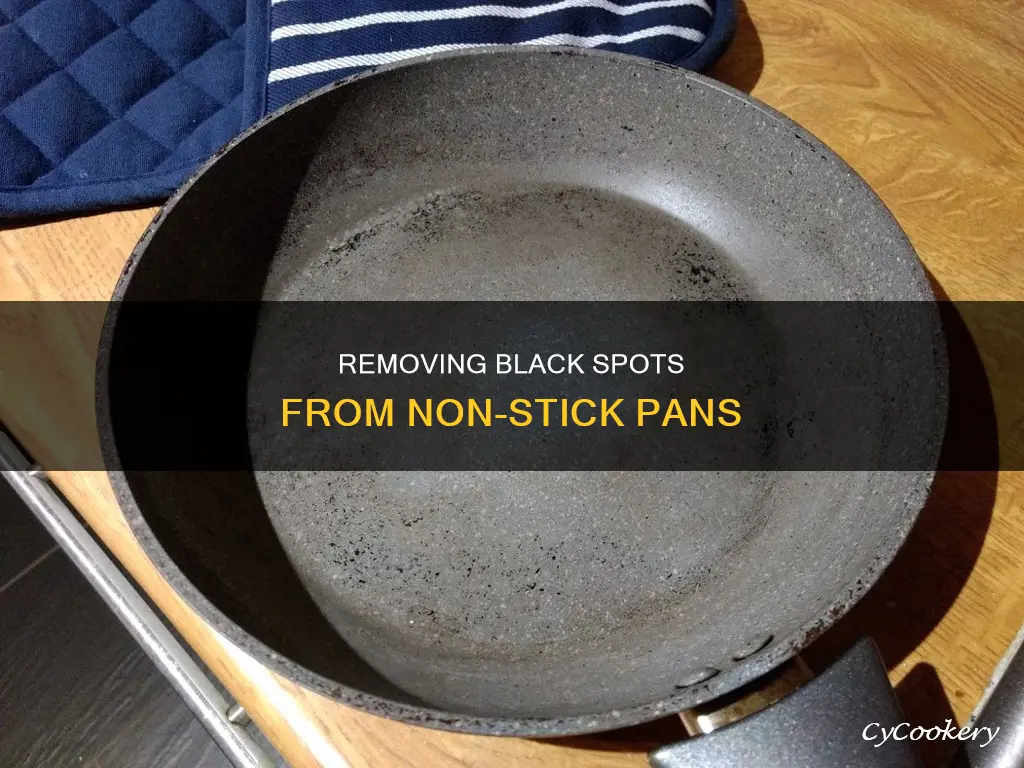 how to get black spots off non stick pan