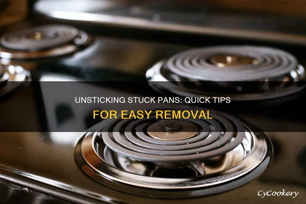 how to get stuck pans under the stove