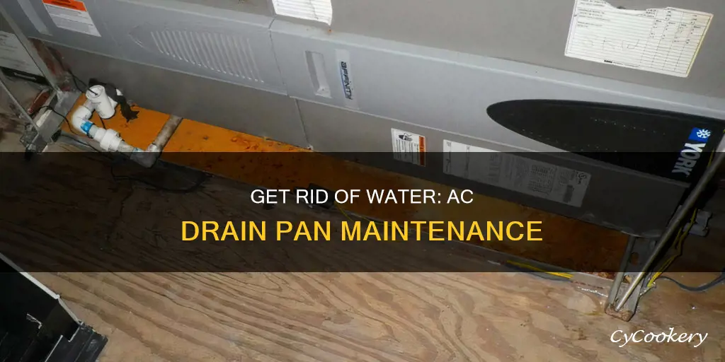 how to get water out of ac drain pan