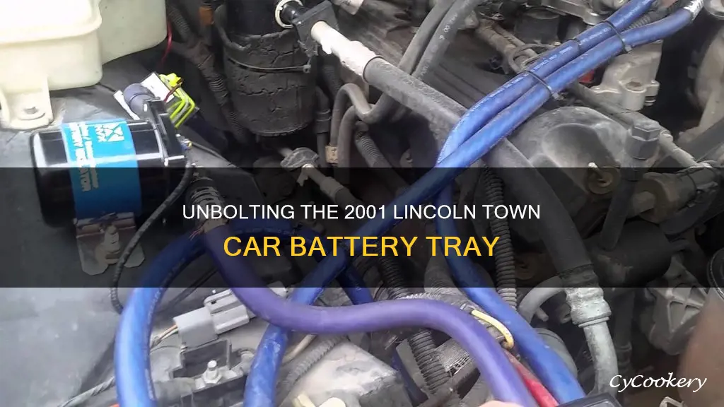 how to remove 2001 lincoln town car battery pan