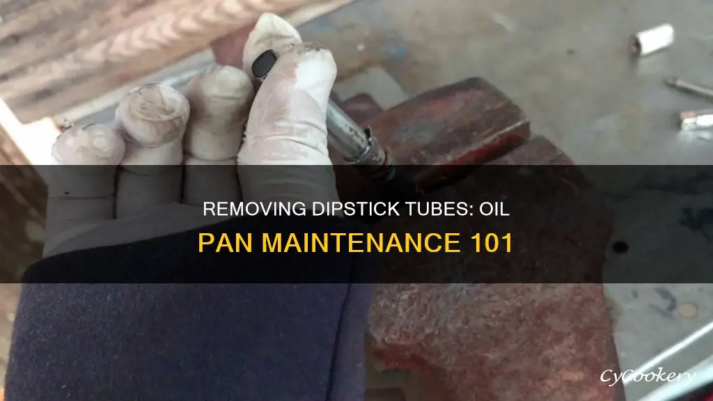 how to remove dipstick tube from oil pan