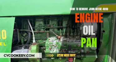 Removing the Engine Oil Pan of a John Deere 4010 Tractor