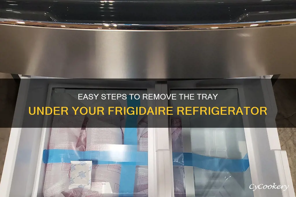 how to remove tray under frigidaire refrigerator