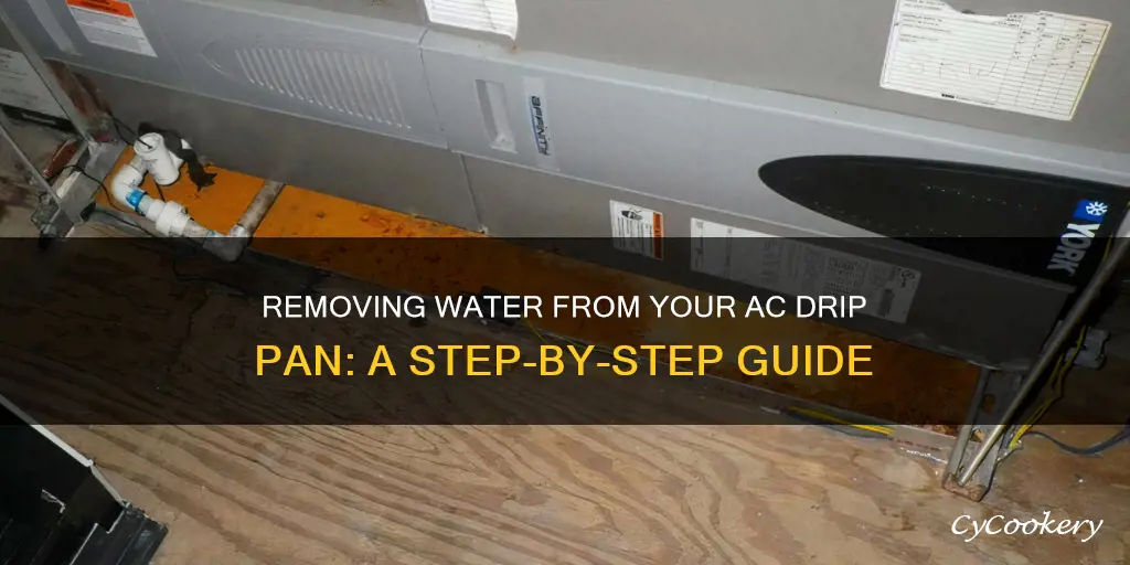 how to remove water from ac drip pan