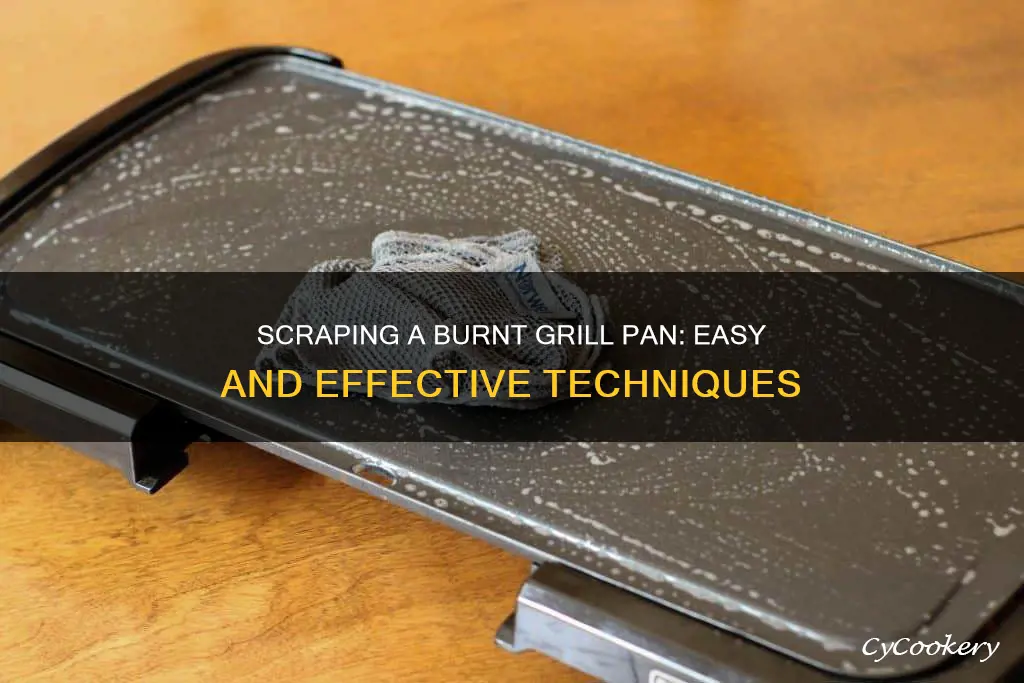 how to scrape burnt grill pan
