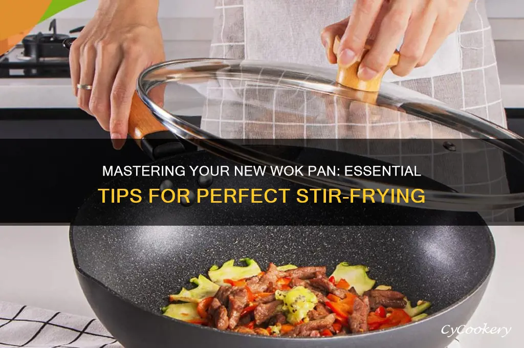 how to use a new wok pan