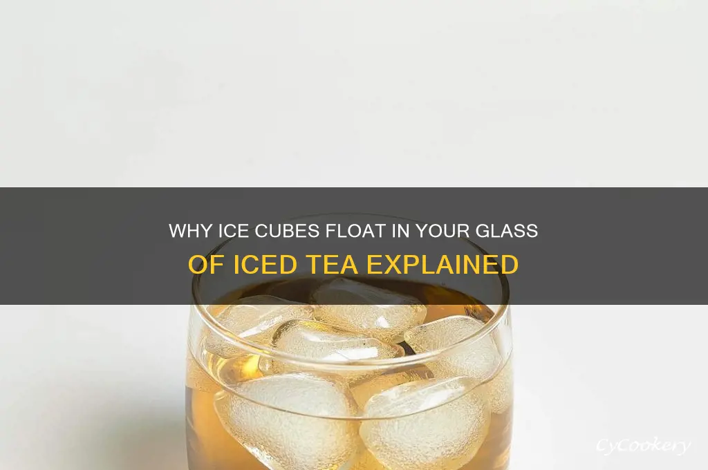 ice cubes float in a glass of iced tea