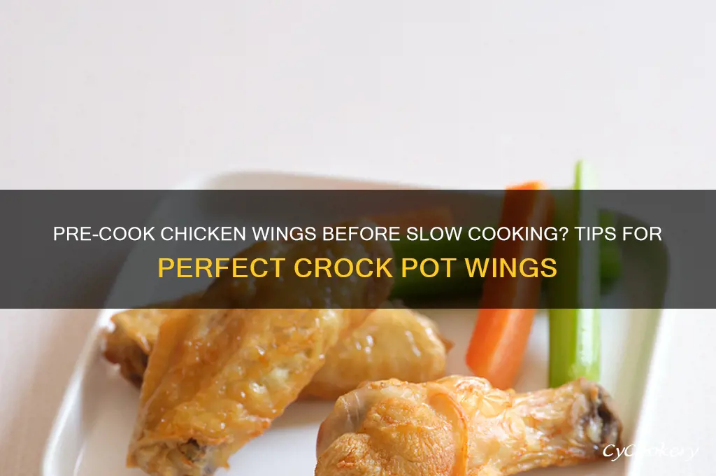 should I cook chicken wings before going into crock pot