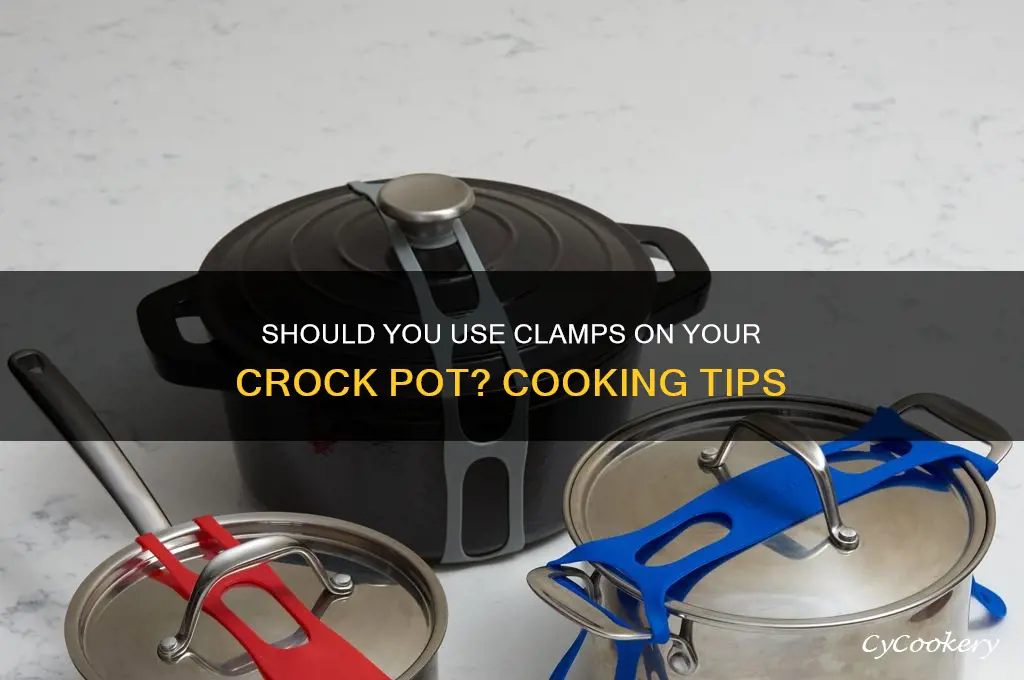 should I have clamps down on crock pot while cooking