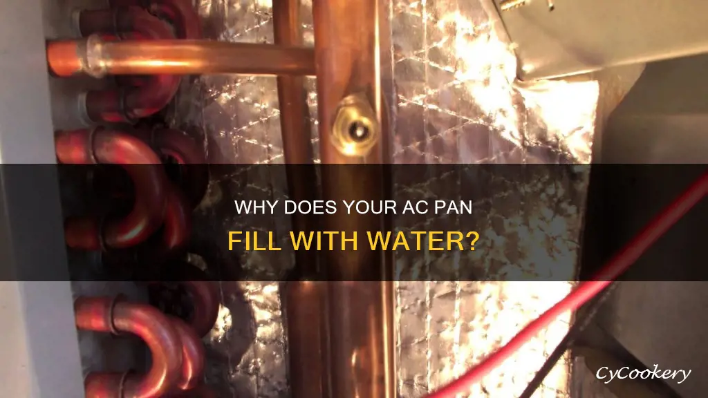 what causes ac pan to fill with water