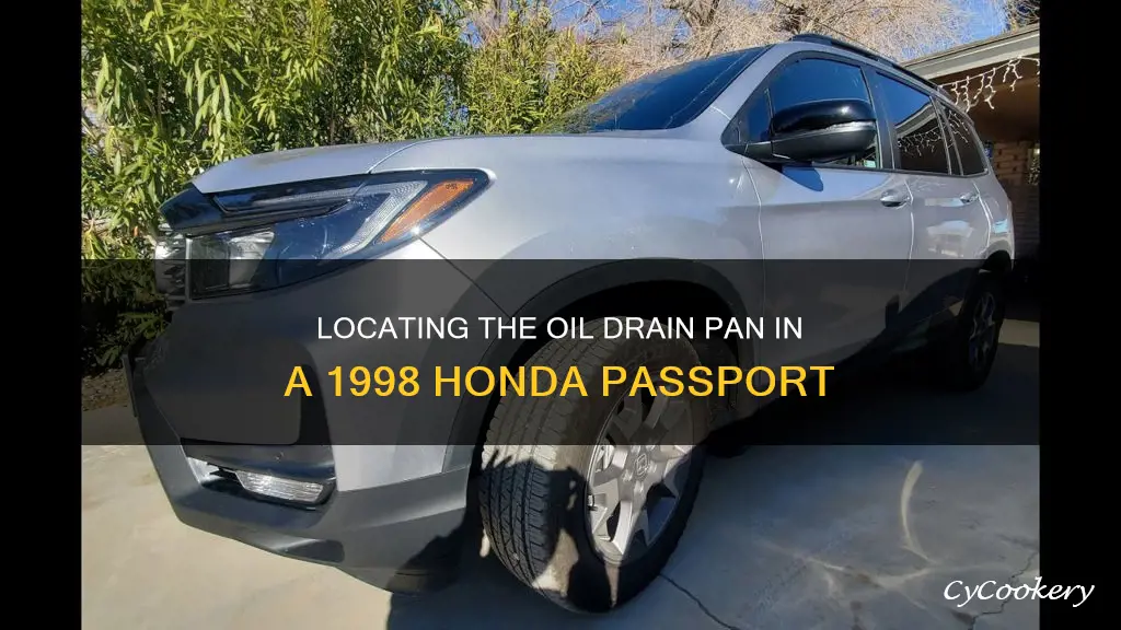 where is oil drain pan 1998 honda passport