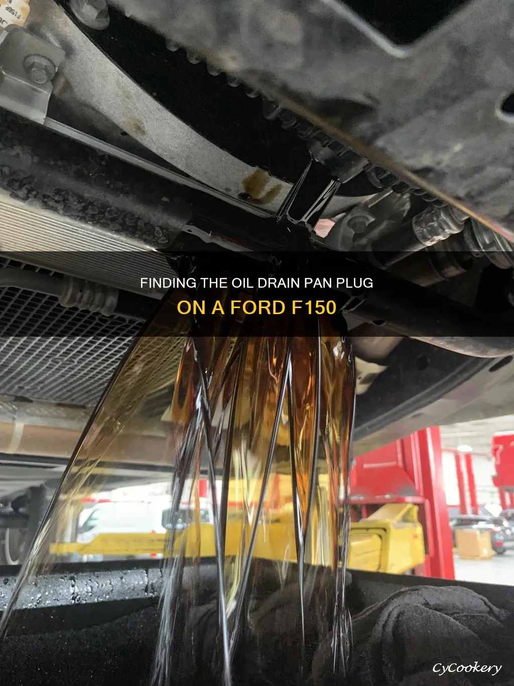 where is oil drain pan plug on a ford f150