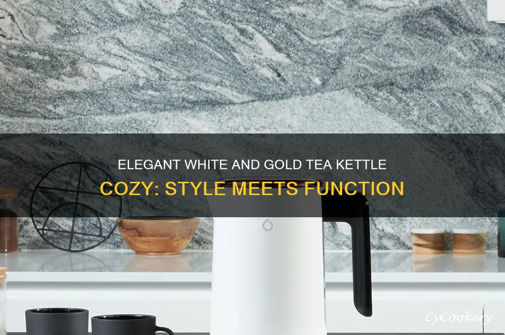 white and gold tea kettle cozy